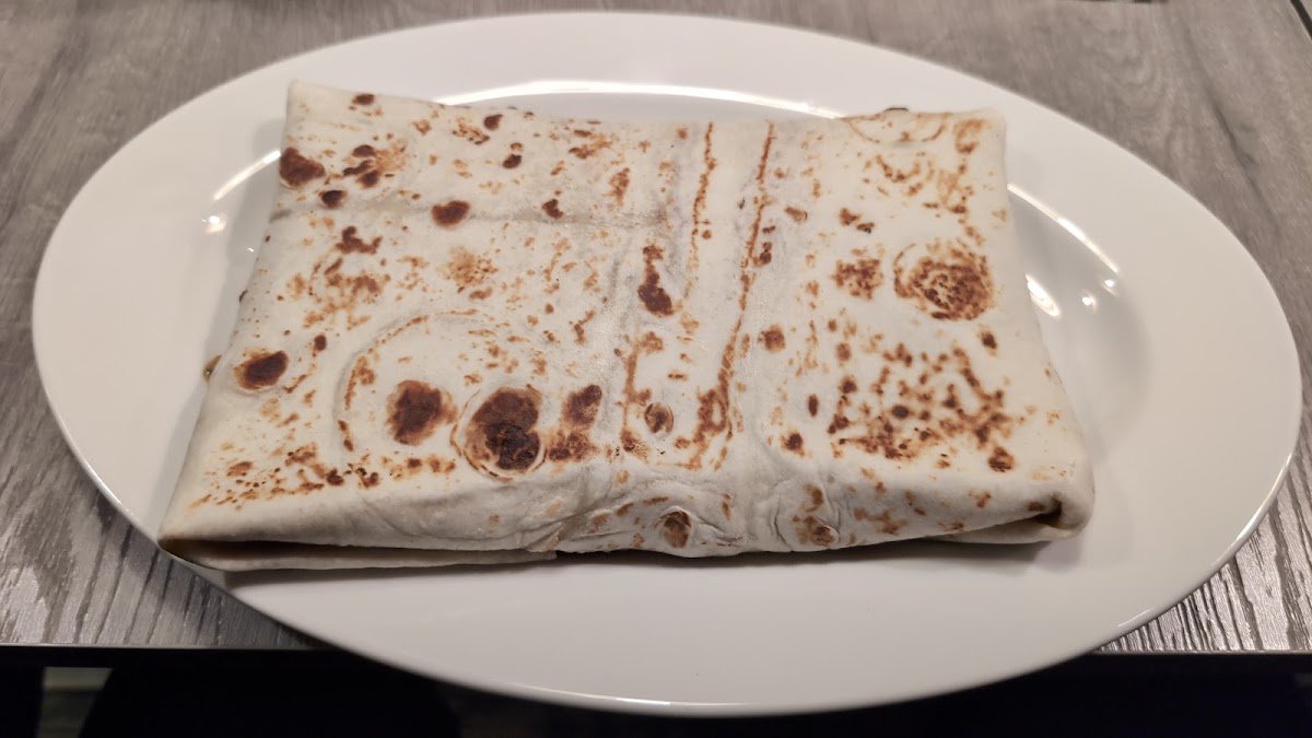 Fresh-made roti at Mother India Roti Queen St West
